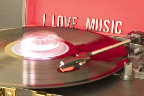 Close up to a turn table needle playing a LP vinyl disc with turn table 스톡 사진