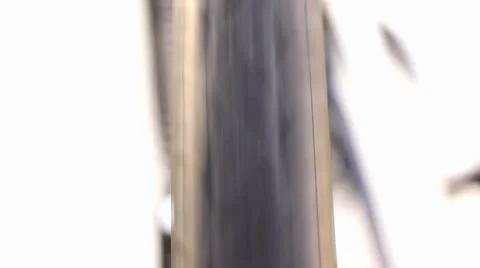 Close-up of Turning Bicycle  Wheel Turn as it Comes to a Stop Video stock 23728640