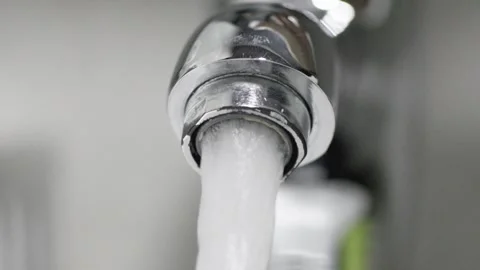 Close-up of turning on the faucet 動画素材 259615711