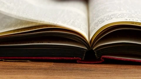 Close-up Turning The Pages Of A Very Old Book Video stock 132734834