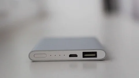 Close-up. Turning on the powerbank Stock Footage 86191477