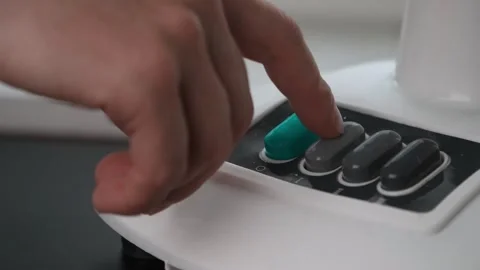 Close up of turning table fan on Stock Footage 345865192