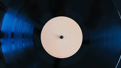 Close up turntable of vinyl record spinning Stock Footage 126270447
