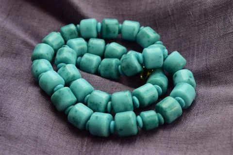 Close-up of twisted turquoise beads Stock Photos