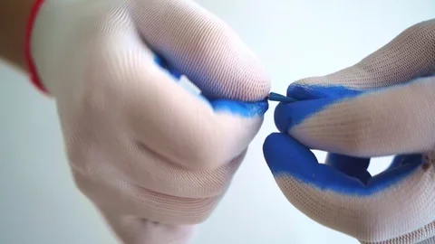 Close-up of twisting two wires. Splicing electrical wires Stock Footage 121574263