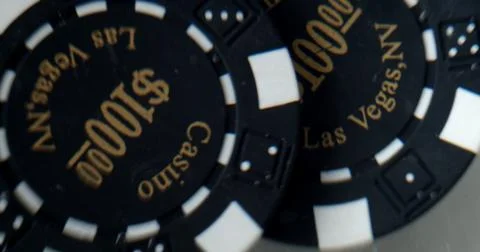 Close up of two $100 poker chips Stock Photos