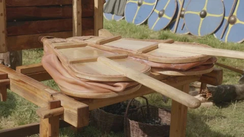Close-up of two bellows blowing air into a forge fire for heating iron Stock Footage 319947300