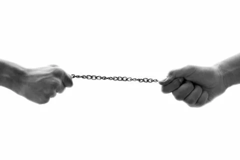 Close up of two blue colored hands isolated on white pulling a rusted chain,  Stock Photos