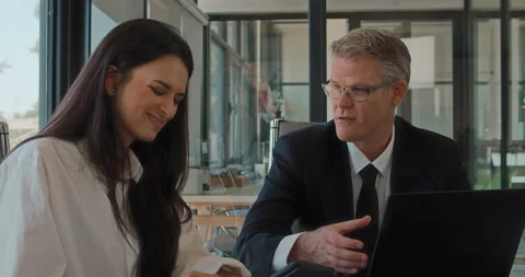 Close up of two business partners having a meeting in an office Stock Footage 139920428