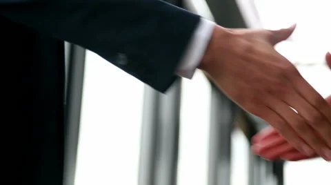 Close up of two businessman shaking hands Stock Footage 59544595