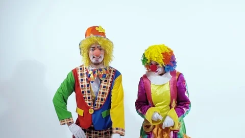 Close-up of two circus clowns dancing together mostly with their hands Stock-Footage 70513188