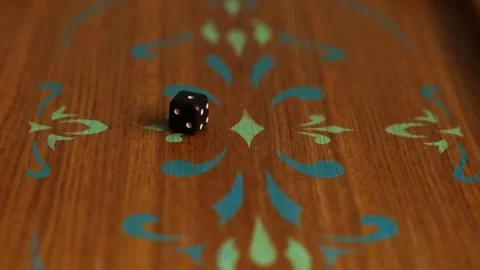 Close-up of two dices fall on the wooden backgammon board. Stock Footage 244833003