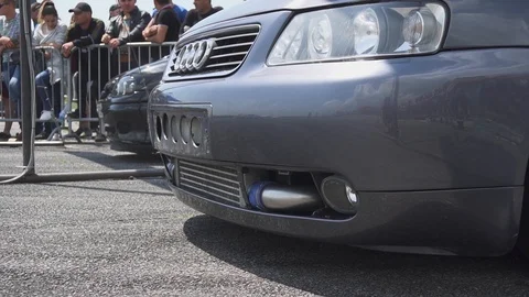 Close up of two drag car approaching the starting line before racing begin 動画素材 115732868