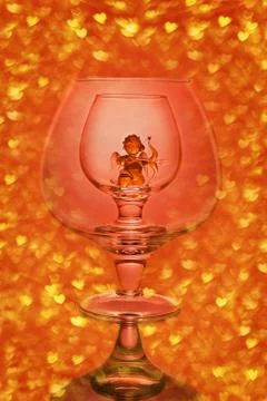 Close-up of two empty glasses on a red background. 스톡 사진