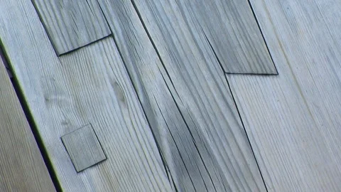 Close-up of two examples of the Japanese style of repairing damaged wood. Stock Footage 154286730