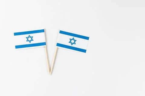 Close up of two flags of israel with copy space on white background Stock Photos