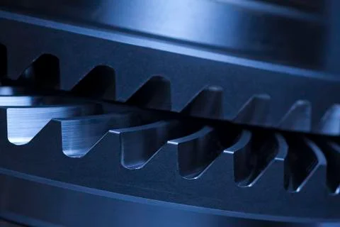 Close-up of two gear wheels in a machine Stock Photos