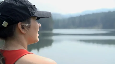 Close Up Two Girls Chat After Long Running Around Lake Stock Footage 36987119