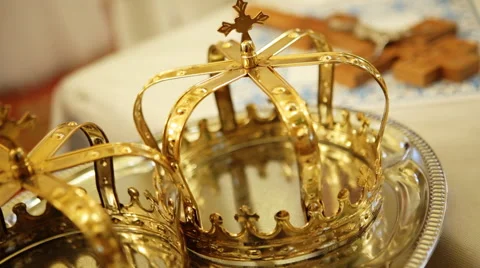 Close up of two gold wedding crowns prepared for ceremony  of marriage in a Stock Footage 61412467