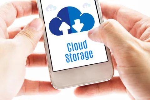 Close up Two hand holding smart phone with Cloud Storage word and icons, Digi Stock Photos