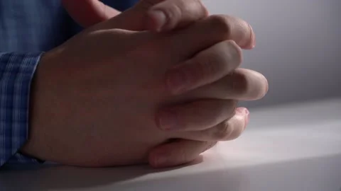 Close-up of two hands folded with fingers Stock Footage 151920790