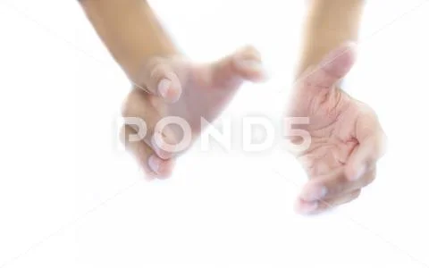 Close up of two hands imagery trying to help the one in need. Stock Photos