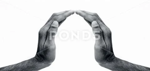 Close up of two hands imagery trying to help the one in need. Stock Photos