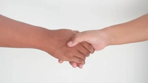 A close-up of two hands shaking hands. Hand gestures when making an agreement. Stock Footage 337807342