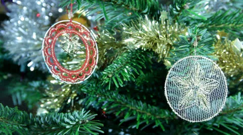 Close up of two lace Christmas tree decorations. Video stock 25590877