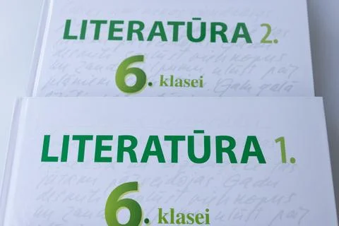 Close-up of two Latvian sixth grade literature textbooks labeled. Fotos de archivo