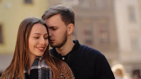 Close up of two lovers holding hands, hugging and talking to each others on the Stock Footage 61825219