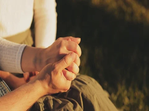 Close up of Two Lovers Holding Hands. SLOW MOTION 4K. Stock Footage 77817381