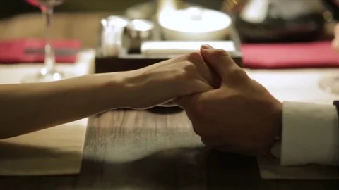 Close up of two Lovers Joining Hands Stock Footage 81446754