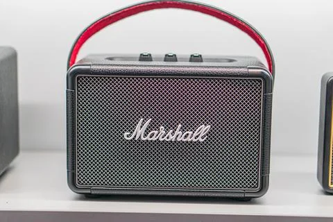 Close-up of two Marshall amplifiers with unique styles against a neutral back Stock Photos