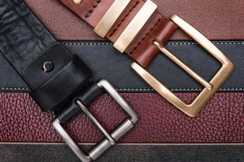 Close-up of two men belts Stock Photos