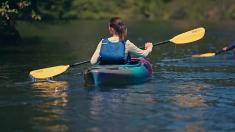 Close Up Two People on Kayaks on River in Oregon Washington Columbia Gorge Stock Footage 280702218