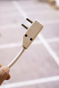 Close-up of Two-Pin Electric Plug in Air Stock-Fotos