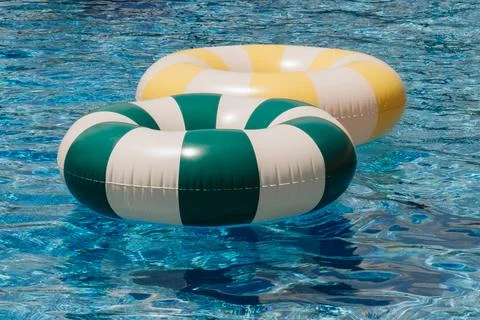 Close-Up of Two Pool Floats 스톡 사진