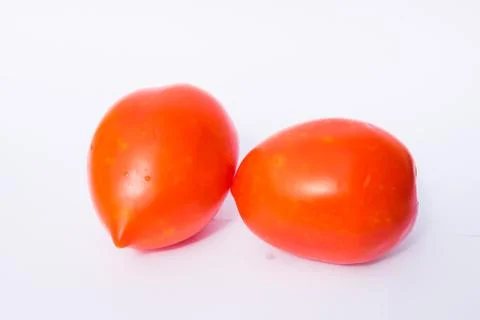 Close up of two red tomatoes isolated Stock Photos