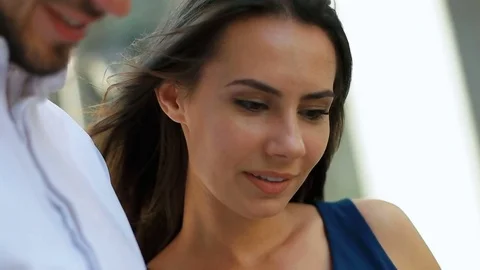 Close up of two serious business partners , working in the street Stock Footage 73813600