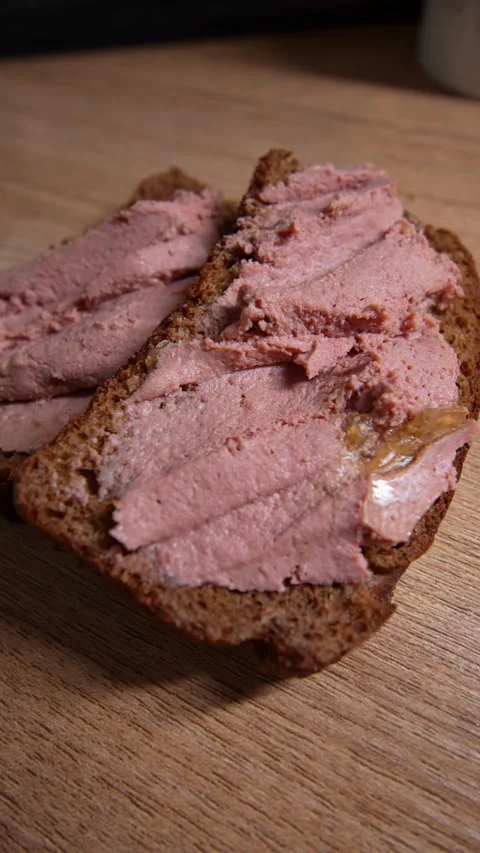 Close-up of two slices of dark rye bread Stock Footage 328580134