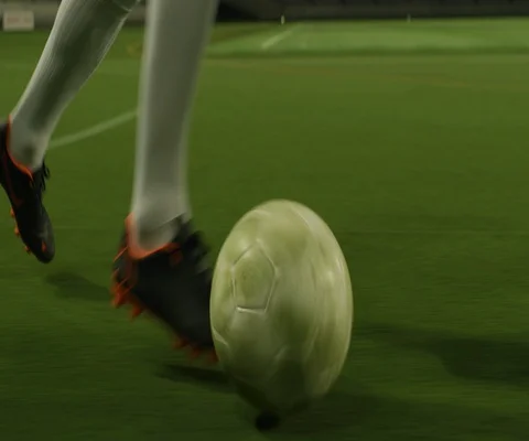 Close up of two soccer players practising on football stadium at night Stock Footage 147058465