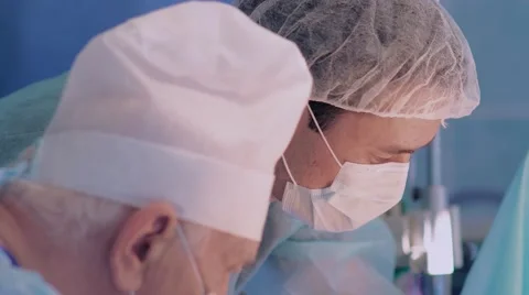 Close-up of two surgeons during operation Stock-Footage 68930696