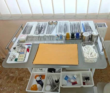 Close-up of a two-tier rolling dental instrument cart in a modern dental clin Stock Photos
