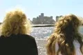 Close up of two women on tour boat watching city Footage