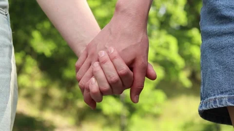 Close-up of two women's hands holding each other Stock-Footage 337615761