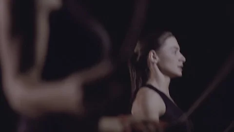 Close-up of two young fair-skinned women doing jump rope workout. Stock-Footage 76910740