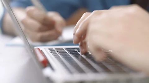 Close up of typing hands at classroom/office. 動画素材 67671722