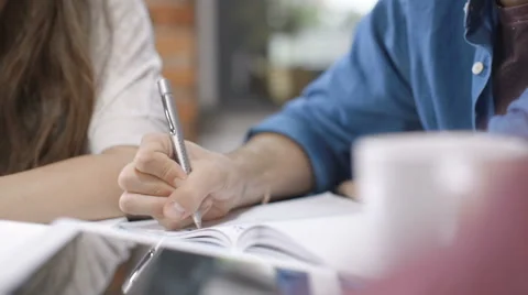 Close up of typing hands at classroom/office. Stock Footage 67953573