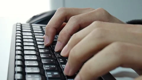 Close up typing on keyboard and use mouse Stock Footage 95028637